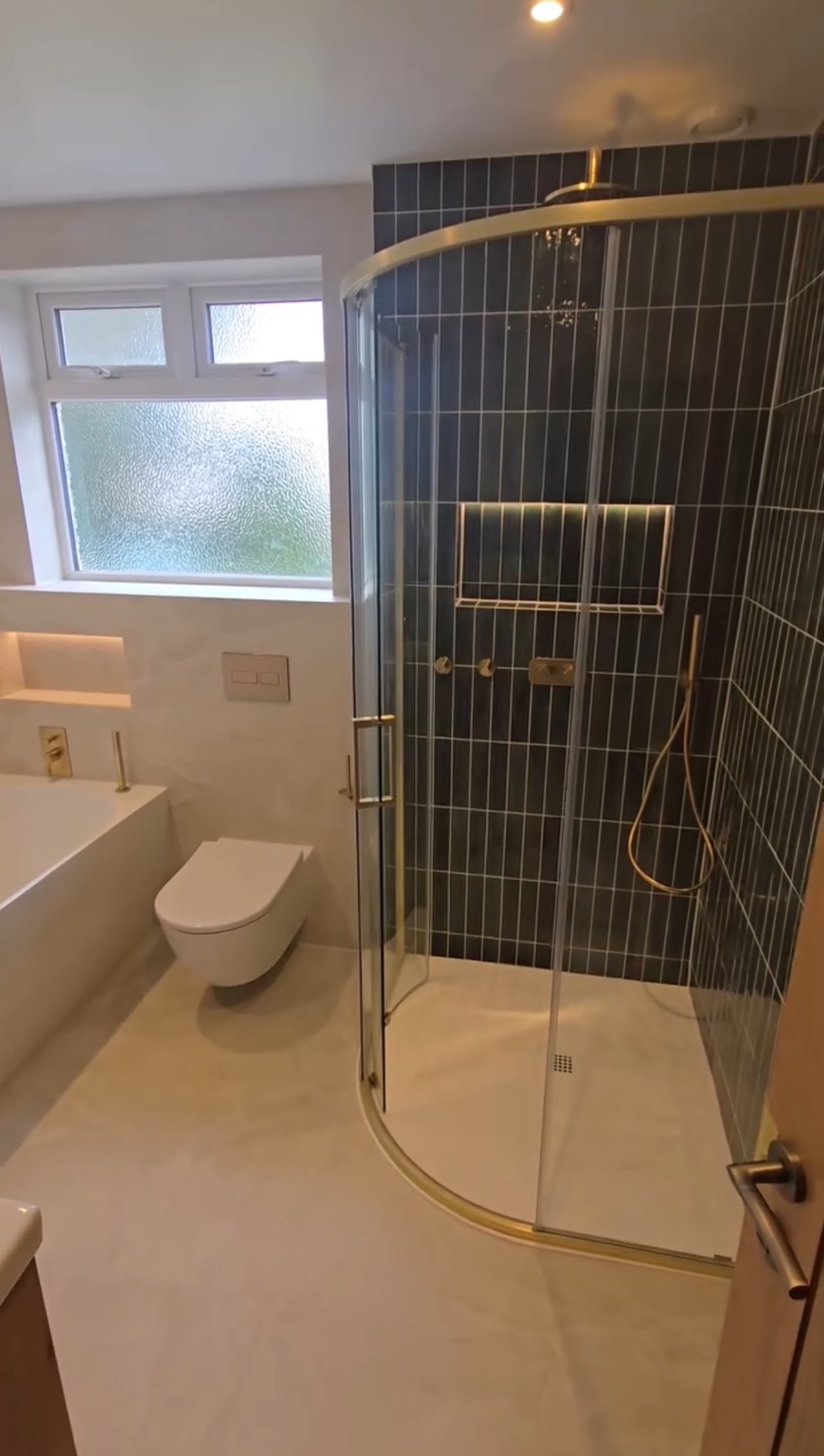 Finished bathroom renovation by Thomas Adams Building